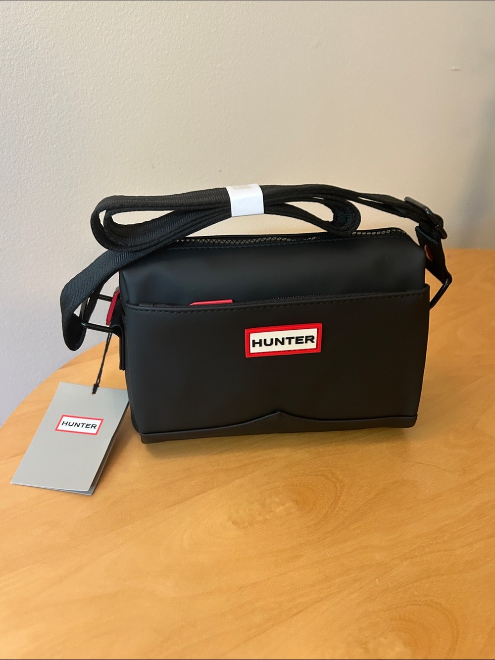 Hunter Black Crossbody Messenger Bag with Red Logo Accents